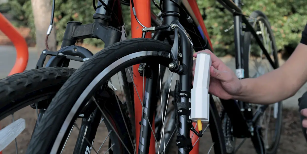 The InfoCycle sensor box on a bike fork